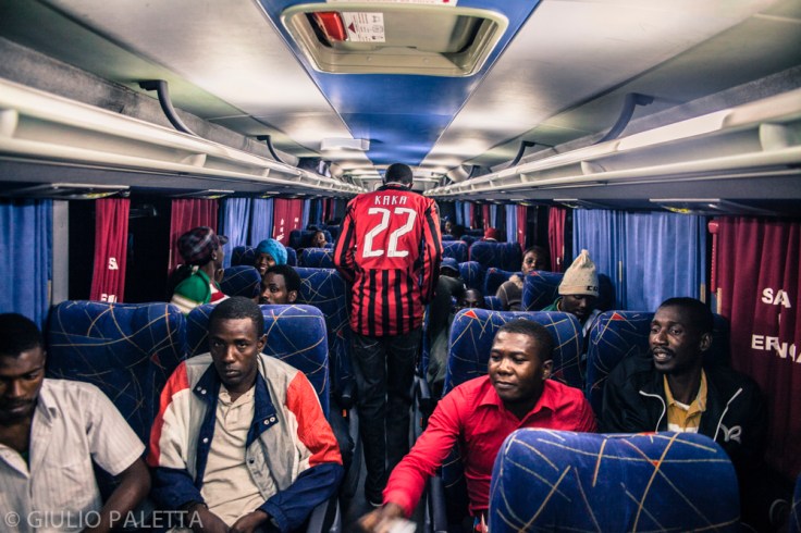 Inside the bus. Haitians and Senegaleses, ready with their bags for the long trip to São Paulo patiently wait the bus to arrive at the refugees center in Rio Branco. Acre government every week rents 2,3 buses to take those immigrants who already got the necessary documents, to São Paulo, a 4 days trip